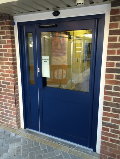 Manual door repaired in Battersea 